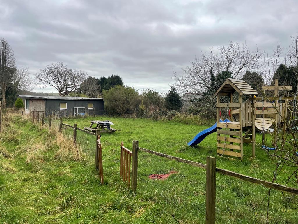 Lot: 20 - FREEHOLD LAND - Play area and outbuilding